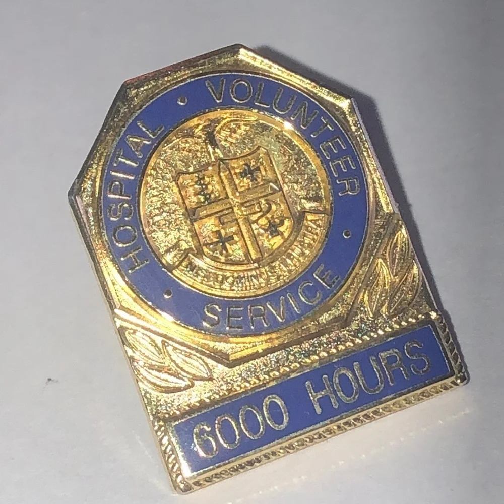 Gold Tone and Blue Hospital Volunteer Service 6000 Hours Vintage Pin